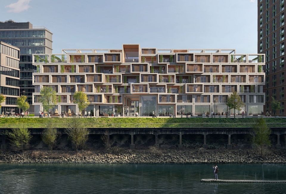 Außenansicht eines terrassierten Wohn- und Bürogebäudes am Wasser mit gestaffelten Raummodulen, begrünten Dachflächen und klar strukturierter Fassadengliederung.