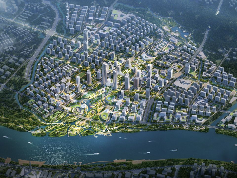 Luftvisualisierung eines gemischt genutzten Stadtareals mit Hochhausclustern, Parkanlagen und Flussufer.