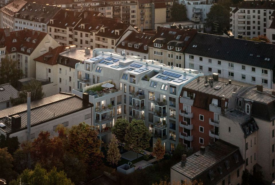 Visualisierung eines innerstädtischen Wohnensembles mit Staffelgeschossen, begrünten Dachbereichen und hofseitigen Balkonen, eingebettet in ein dicht bebautes urbanes Quartier.