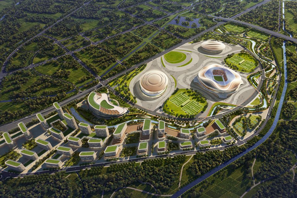 Großmaßstäbliche Luftvisualisierung eines Sportcampus mit Arenen, Landschaftszonen und umliegender Bebauung.
