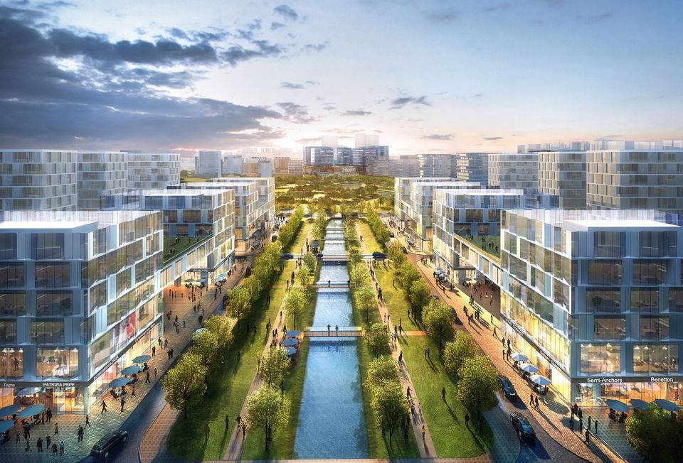 Außenvisualisierung eines urbanen Quartiers mit zentraler Wasserachse, beidseitiger Blockrandbebauung und großzügigen Grün- und Wegeflächen.