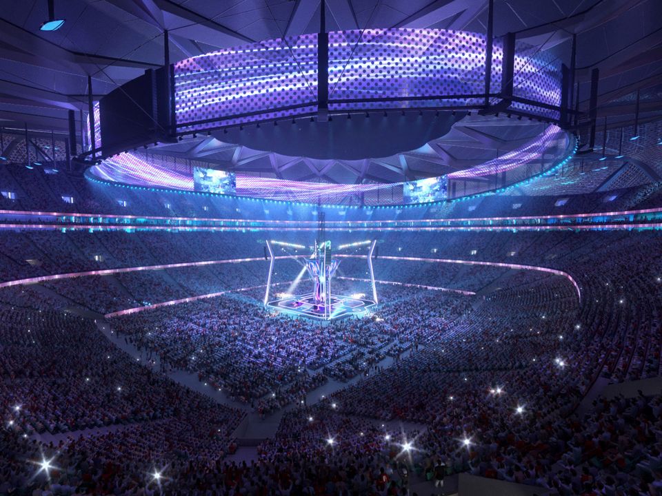 Innenvisualisierung eines gefüllten Stadions während eines Großevents mit zentraler Bühnenkonstruktion, umlaufenden Rängen und großformatigen Lichtinstallationen.